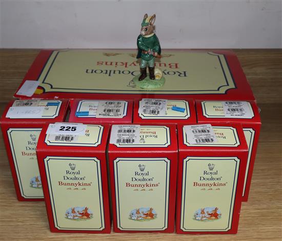 A Royal Doulton Bunnykins Robin Hood set with stand